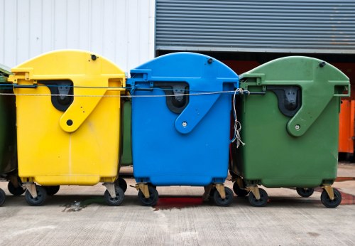 Professional team sorting recyclable materials during waste clearance