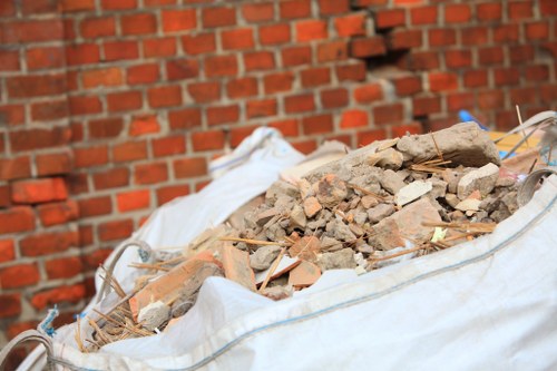 Before and after loft clearance in a Chiswick home